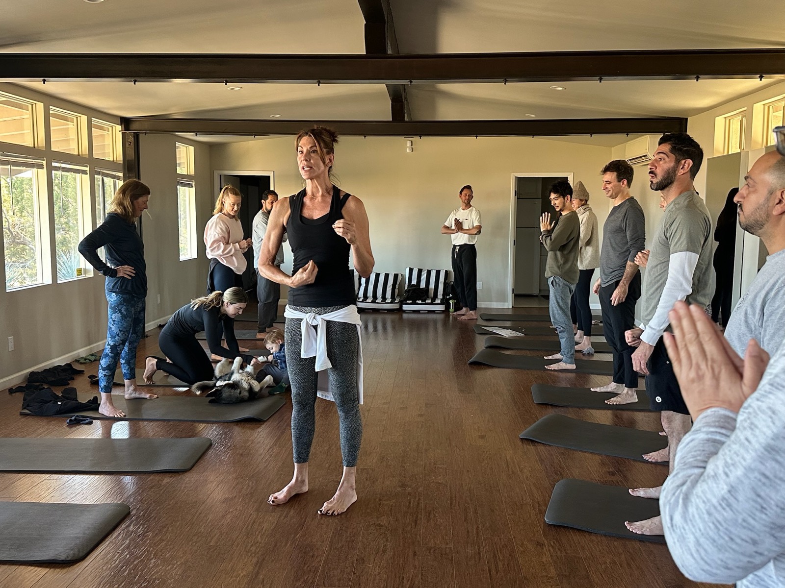 Alicia Gilbert teaching a standing movement sequence to a workshop group